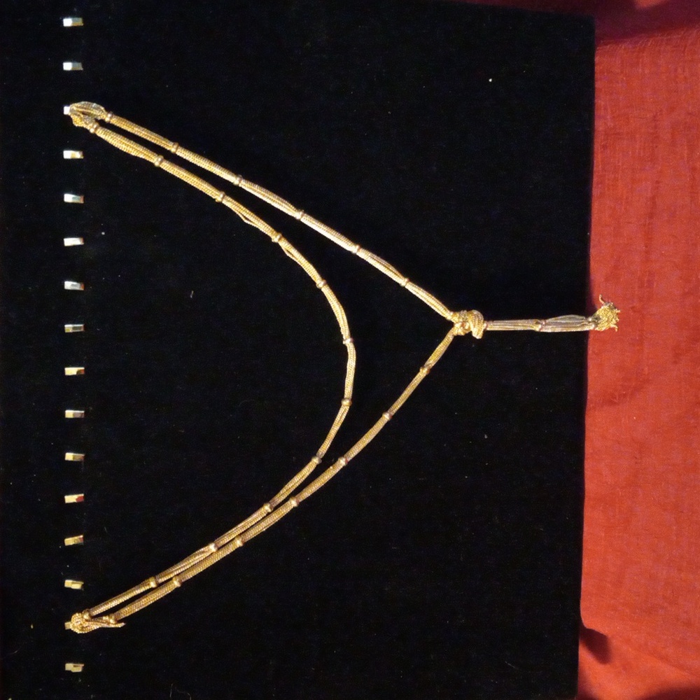 Beautiful bright gold tone lariat necklace long multi chains with bead spacers.